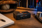 FieldFire Spark controller on an independent maker's workbench with baseball equipment.
