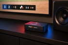FieldFire Spark controller in a home baseball watch-party setup with existing TV and speaker equipment.